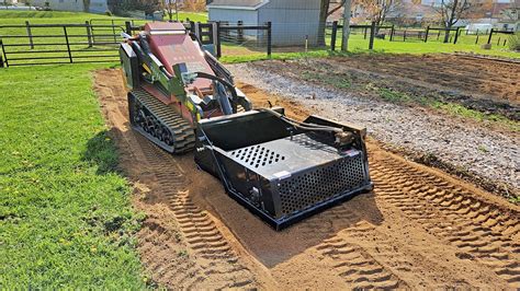 skid steer power rake rental with operator|pull behind rock rake rental.